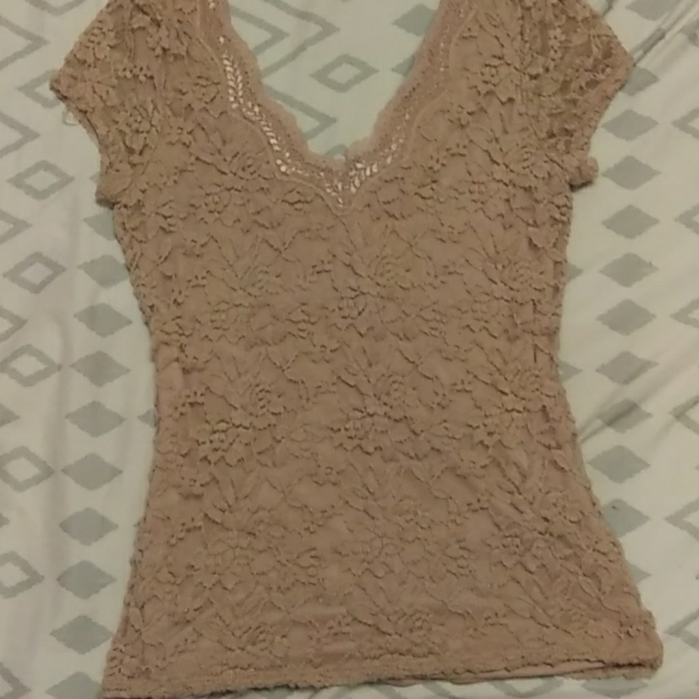 Pink lace shirt.